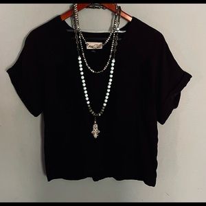 Black Short Top. It goes with just about everything! Necklaces not included.